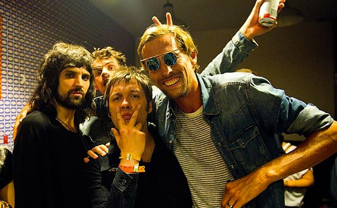 Watch England footballer Peter Crouch crowdsurf at a Kasabian gig
